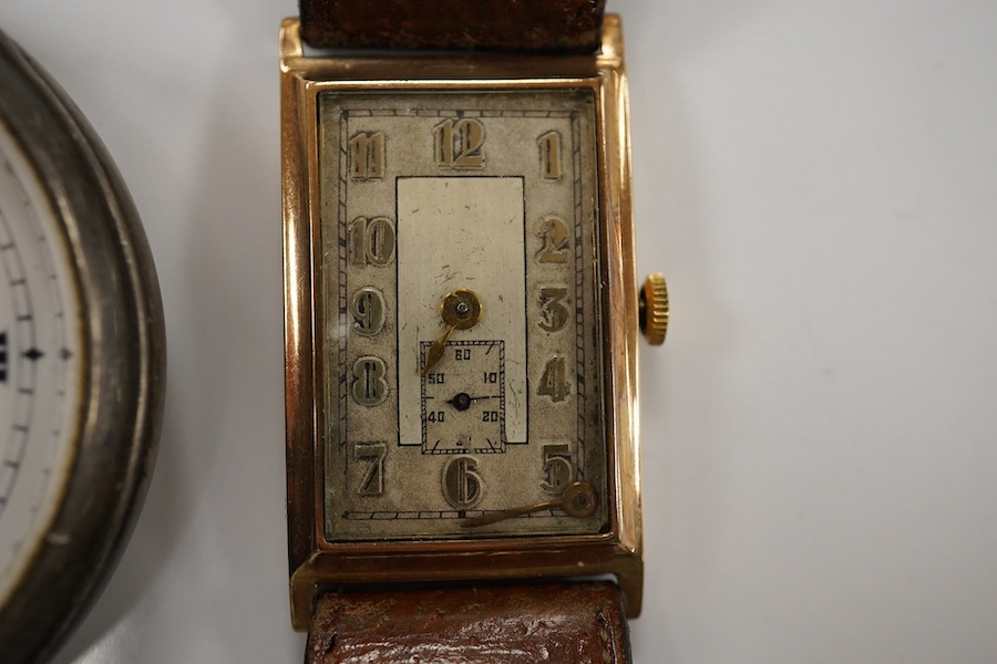 A gentleman's 1930's 9ct gold rectangular dial manual wind wrist watch, with Arabic dial and subsidiary seconds, case diameter 22mm, together with a George V silver J.W. Benson open faced pocket watch. Condition - poor t